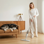 Woman cleaning a room with a dog on a couch